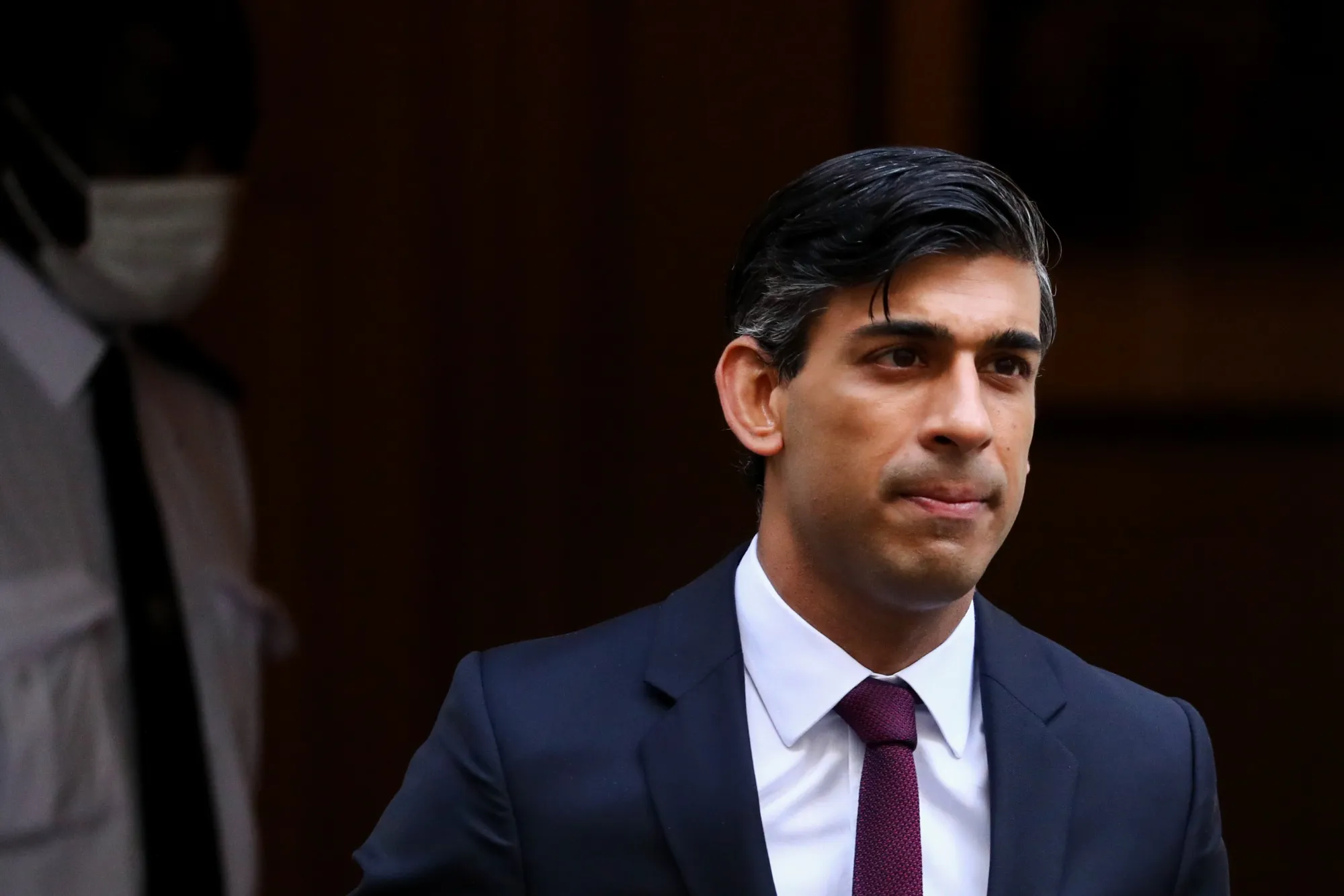Rishi Sunak departs Downing Street on his way to present his 'Winter Economy Plan' at Parliament in London, on Sept. 24.