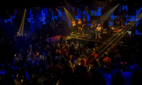 A singer performs during a party for an Olympian at the Heineken Holland House.