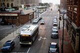 A Detroit Department of Transportation (DDOT) bus travels along Grand River Avenue in Detroit, which will be getting more than $24 million to implement a citywide traffic safety action plan. 