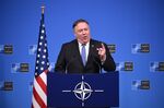Mike Pompeo speaks at the NATO headquarters on Dec. 4.