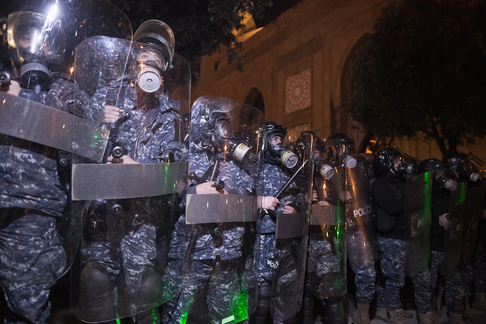 Riot police advance toward anti-government protesters in Beirut on Jan.&nbsp;25.&nbsp;