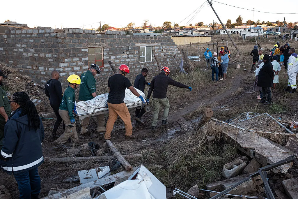 The Givers Foundation search and rescue team carry a body near Mthatha after a flood.