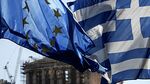 A European Union (EU) flag, left, flies beside a Greek national flag in front of the Parthenon temple on Acropolis Hill in Athens, Greece.
