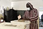 A voter casts a ballot&nbsp;in Dakar, on Jan&nbsp;23.&nbsp;