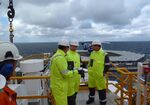 Terje Soviknes, Norway's petroleum and energy minister, center, speaks with Tim Dodson, Statoil ASA's head of exploration,right, and Jez Averty, Statoil ASA's head of exploration for Norway and the UK, aboard Songa Offshore's Songa Enabler rig, operated by Statoil ASA, in the Snohvit gas field in the Barents Sea off the coast of northern Norway, on Monday, April 24, 2017. Norway is betting the under-explored Barents could boost its oil industry, after crude production fell by half since 2000.