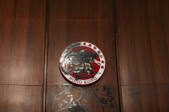 Hong Kong Protester Who Defaced the City Emblem Is Still Angry