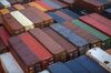 Shipping containers sit stacked on the Hapag-Lloyd Holding AG Prague Express cargo ship at the Cia Siderurgica Nacional SA (CSN) Sepetiba Tecon terminal inside the Port of Itaguai in Rio de Janeiro, Brazil, on Friday, Aug. 19, 2016. Brazil's government will launch a PR campaign following the Olympics in Rio to create an image of "credibility" after prolonged economic and political crisis, country's chief export official says in interview.