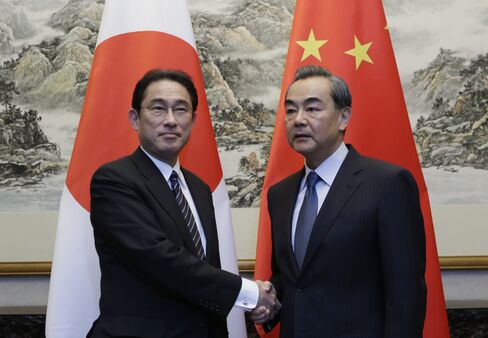Fumio Kishida and Wang Yi on April 30.