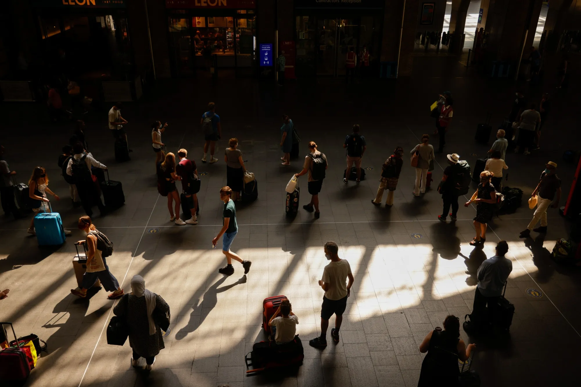 Commuters at London King's Cross railway station in London.