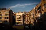 Sunlight hits residential apartments in the Sant Antonio neighborhood of Barcelona, Spain.