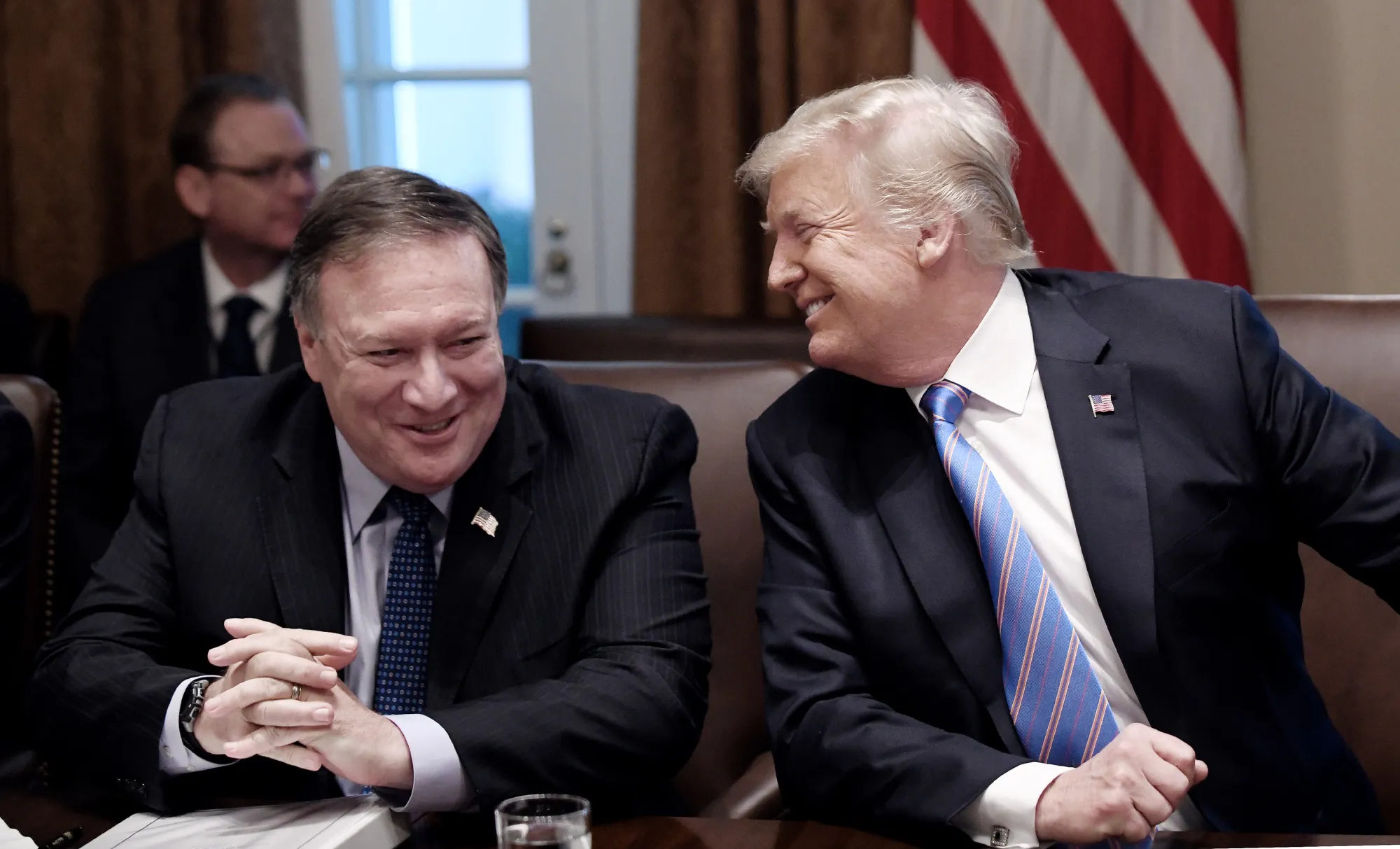 Sharing a foreign-policy joke.