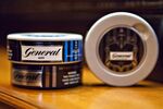 Tins of Swedish Match AB General snus smokeless tobacco.