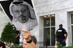 A demonstrator holds a poster during a rally about the disappearance of Washington Post journalist, Jamal Khashoggi outside the Embassy of Saudi Arabia on in Washington, D.C. on Oct. 10.
