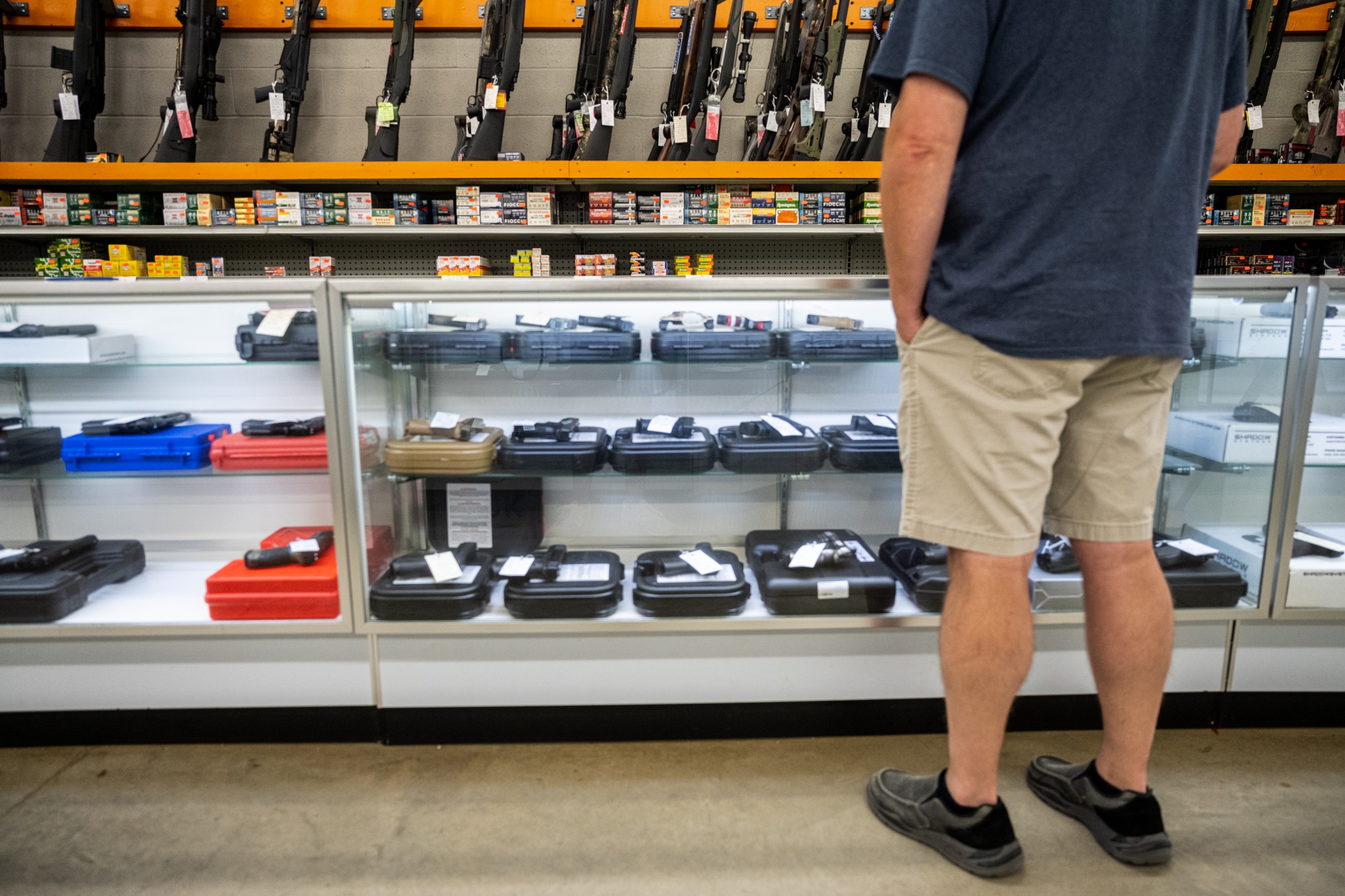 A customer views handguns for sale at a store&nbsp;in West Point, Kentucky.