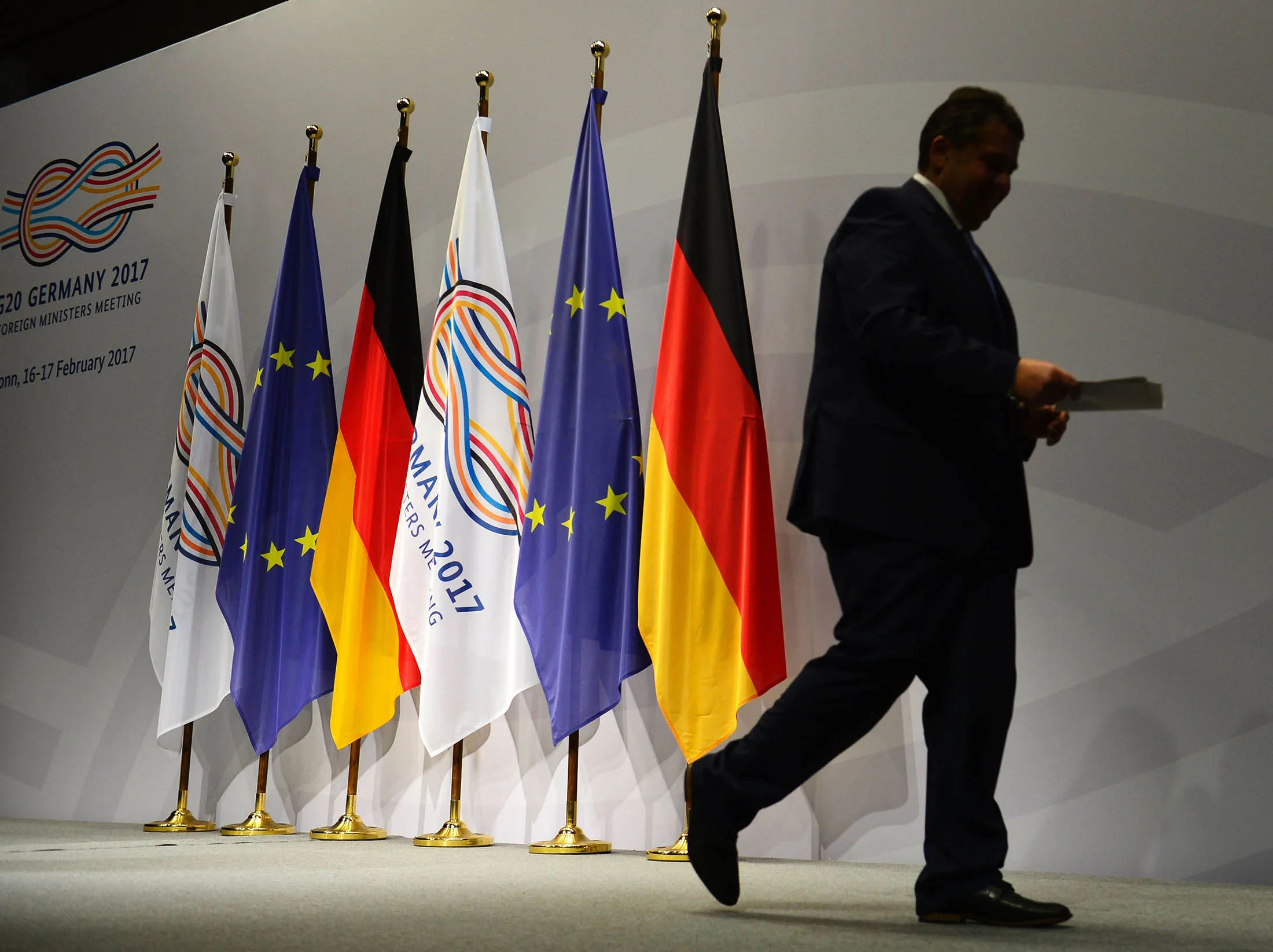 German Foreign Minister Sigmar Gabriel leaves after his speech during the G-20 foreign ministers' meeting at the World Conference Center on February 16, 2017 in Bonn, Germany. / AFP / Sascha Schuermann (Photo credit should read SASCHA SCHUERMANN/AFP/Getty Images)
