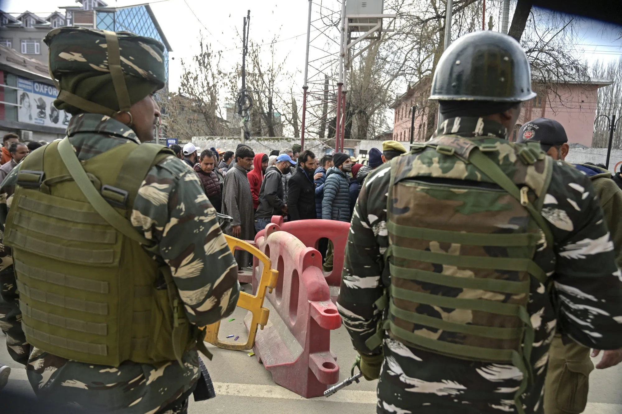 Security stand guard ahead of a rally by Narendra Modi in Srinagar on March 7.