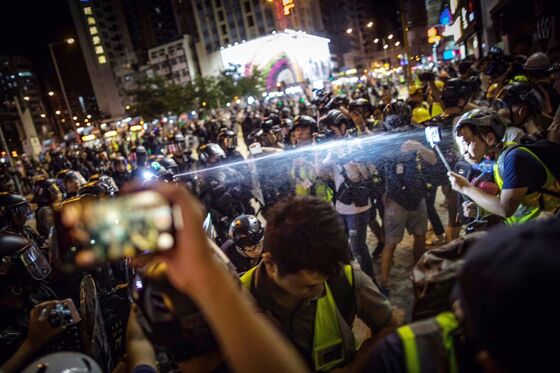 Police Fire Tear Gas, Protesters Start Blazes: Hong Kong Update