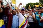 Venezuelan opposition supporters rally in front of the the National Assembly in Caracas, on Jan. 5, in support of their newly elected deputies the day of their installation. Venezuela's President Nicolas Maduro ordered the security forces to ensure the swearing-in of a new opposition-dominated legislature passes off peacefully Tuesday, after calls for rallies raised fears of unrest.