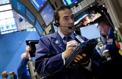 Stocks Rally as Treasuries, Dollar Retreat on Economic Data