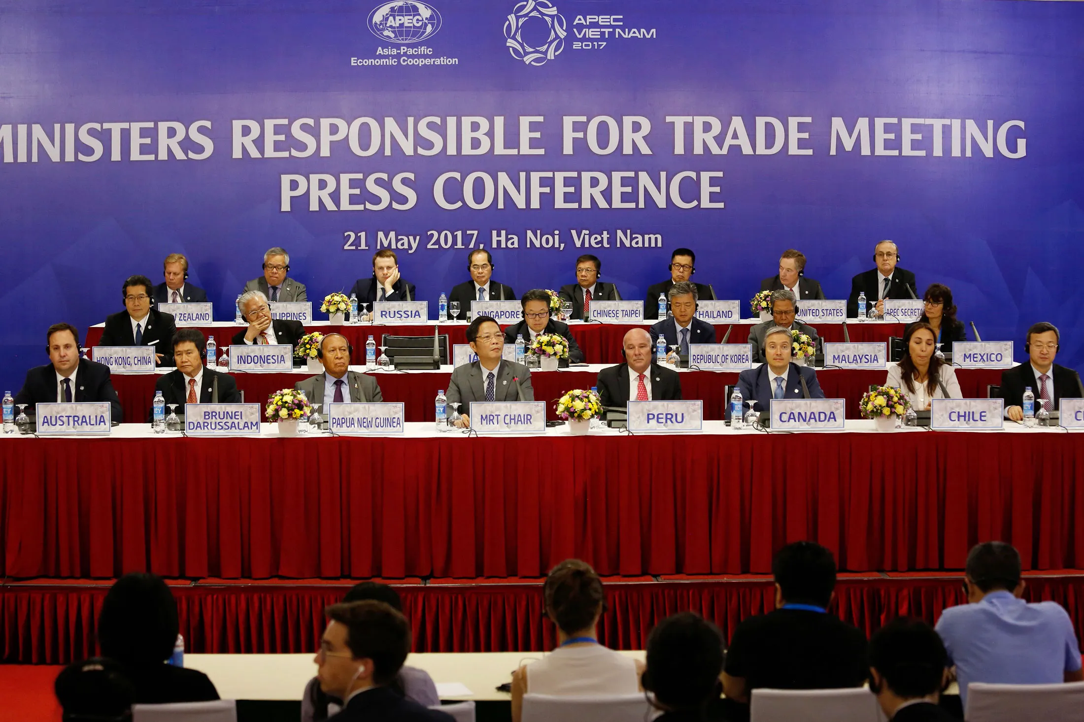 Trade ministers attend a press conference during the Asia-Pacific Economic Cooperation (APEC) Ministers Responsible For Trade (APEC MRT 23) meeting in Hanoi on May 21,
