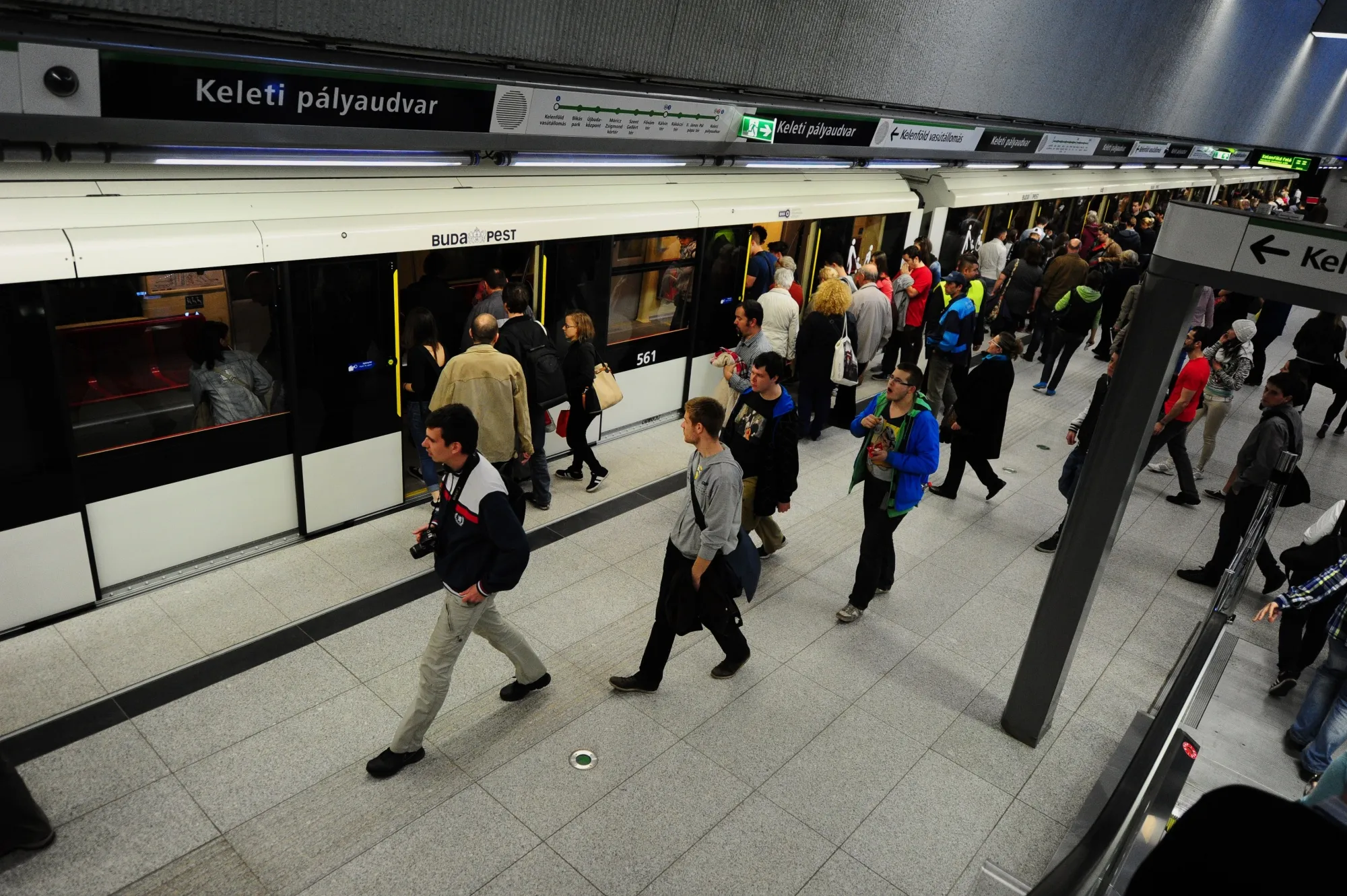 Passangers board a metro train in Budapest, Hungary.