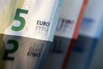 A five, ten and 20 euro banknote stand in this arranged photograph.