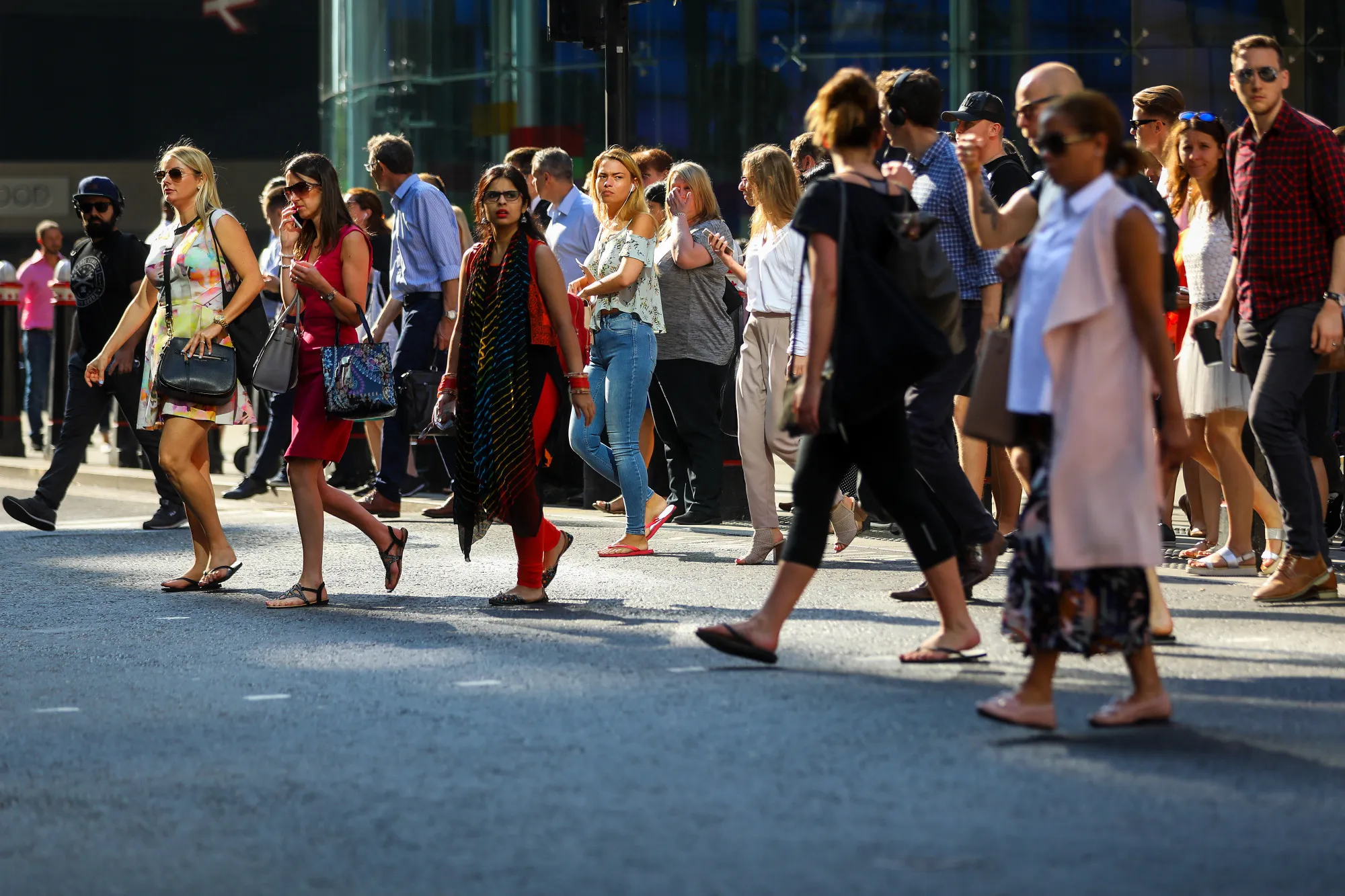 Pedestrians cross the road near Cannon Street Station in London, U.K., on&nbsp;July 6, 2018.&nbsp;