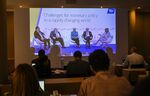 Journalists follow a meeting during the European Central Bank’s annual Forum on Central Banking on June 29 in Sintra, Portugal. On screen from left are Bank of England Governor Andrew Bailey, General Manager of Bank for International Settlements Agustín Carstens, President of the European Central Bank Christine Lagarde, Chair of the US Federal Reserve Jerome Powell and Bloomberg Television anchor Francine Lacqua.