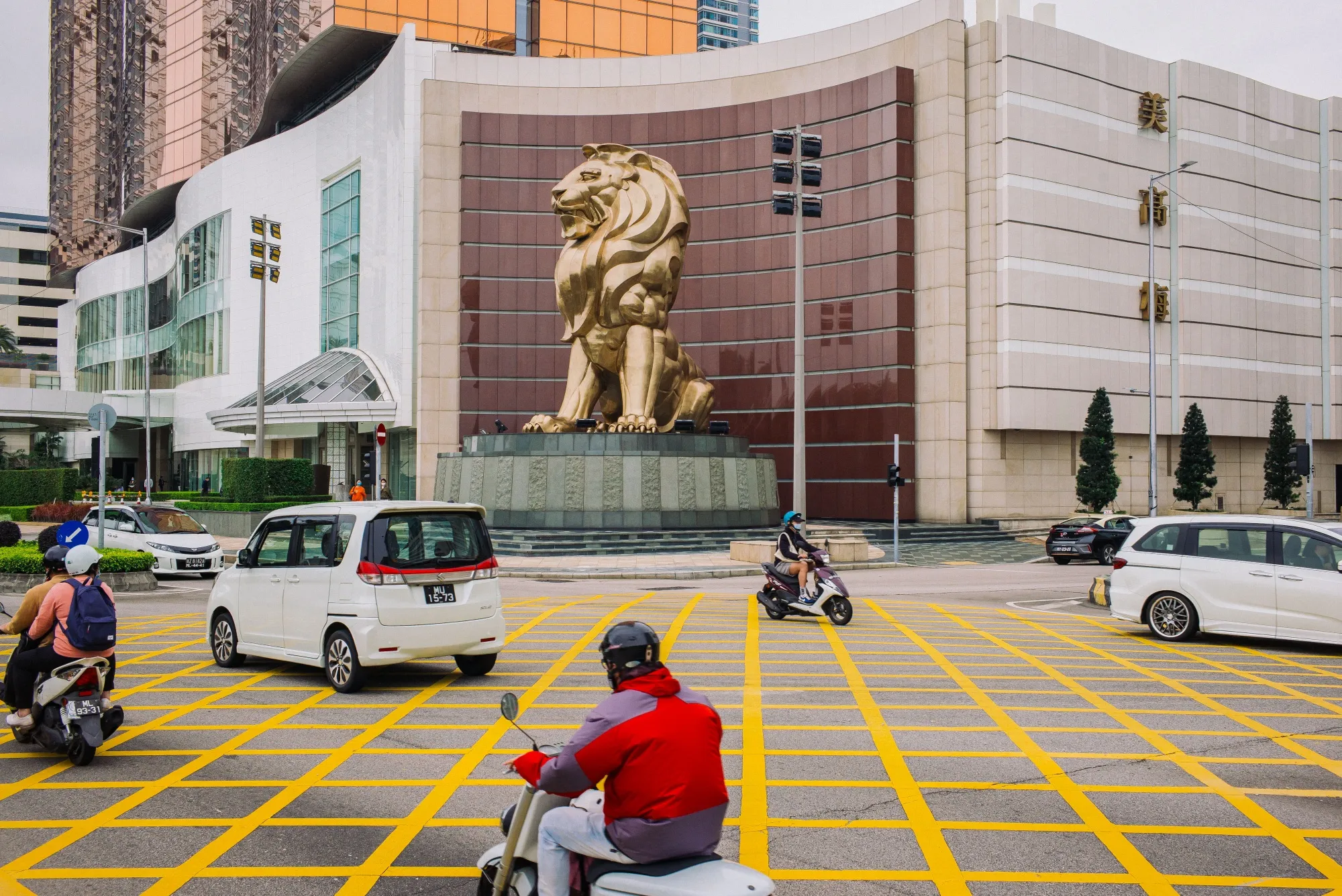 Vehicles pass the MGM Cotai casino resort in Macau, China, on March 3.