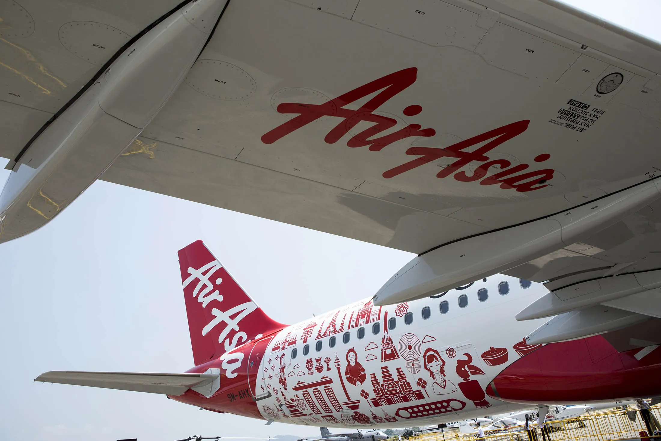 An AirAsia aircraft stands on the tarmac before its unveiling at the Langkawi International Maritime and Aerospace Exhibition in Malaysia.
