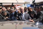 Palestinian Prime Minister Rami Hamdallah waves to the crowd upon his arrival in Gaza City on March 13.