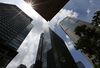 The Otemachi Tower, center, which counts the Bank of Japan as an owner, stands at dusk in the Otemachi district of Tokyo, Japan, on Friday, June 10, 2016. Japan's real estate investment trusts (J-REIT) have soared in value to become the priciest in the world. More purchases by one of the biggest investors in the landlord business -- the Bank of Japan -- may help propel prices even higher.