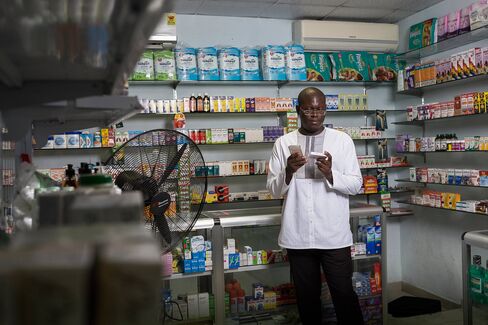 Simons at a pharmacy on Drug Lane in Accra, Ghana.
