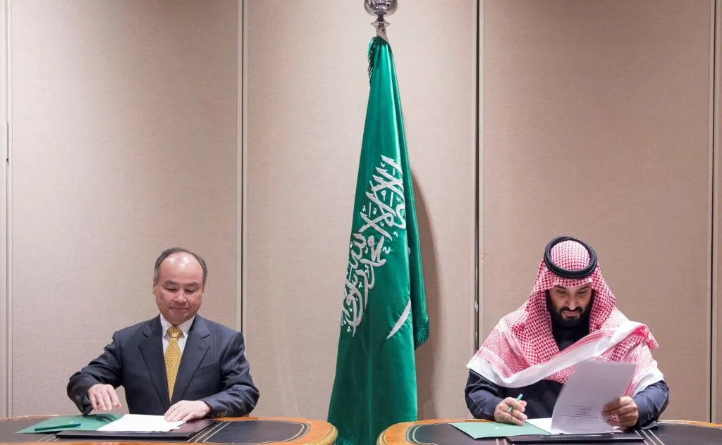 Son, left, can’t afford not to take MBS’s money.