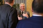 Christopher Waller, governor of the U.S. Federal Reserve, speaks with attendees during the Center for Financial Stability Event in New York, U.S., on Friday, Nov. 19, 2021. 