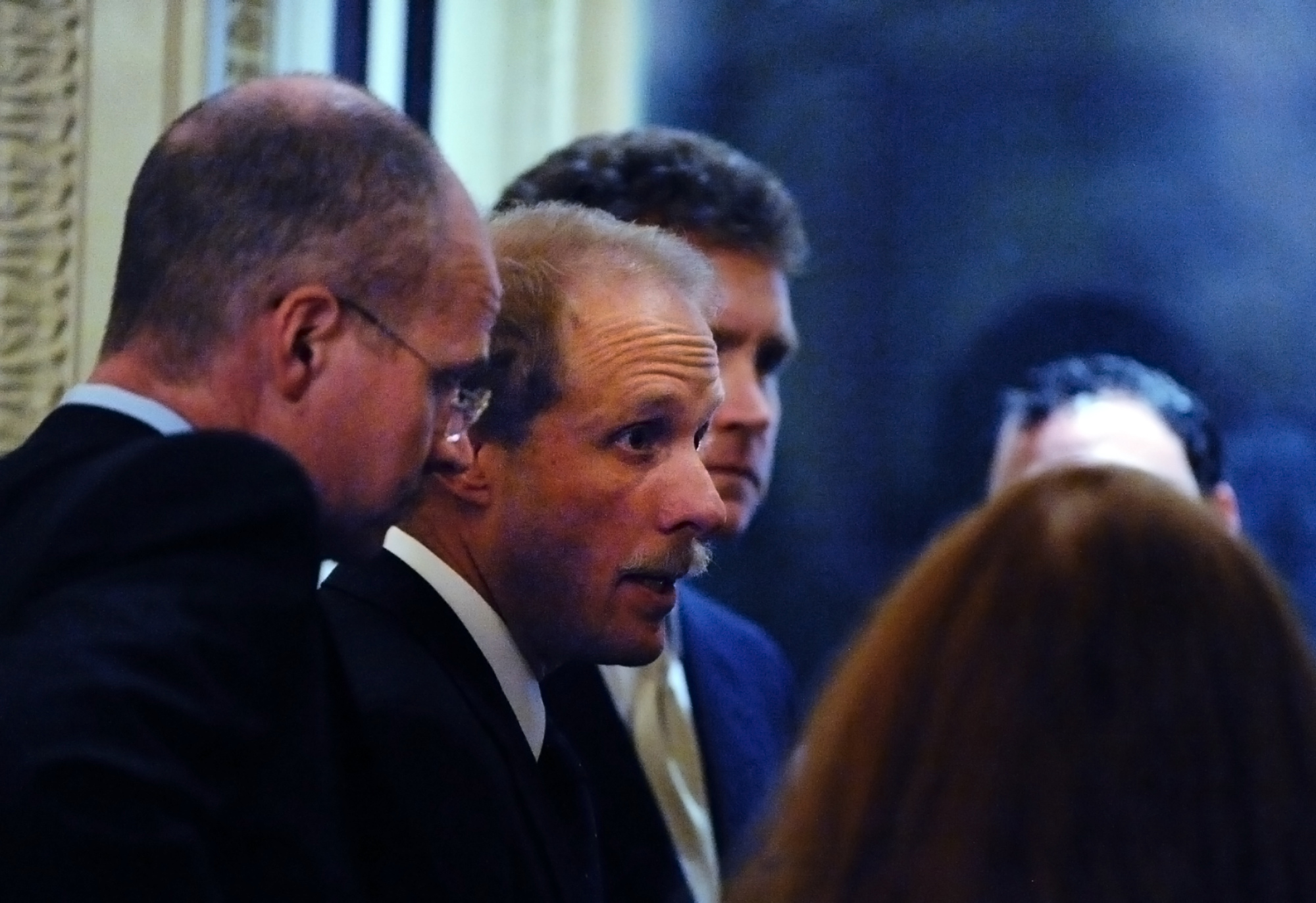 Stephen Feinberg convenes with his crew as lawmakers discuss the auto bailout bill at the US Capitol in Washington, D.C., on Dec. 11, 2008.
