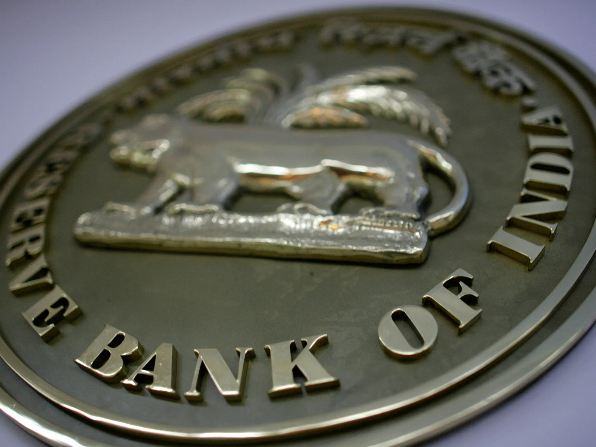 The seal for the Reserve Bank of India hangs on a wall in th