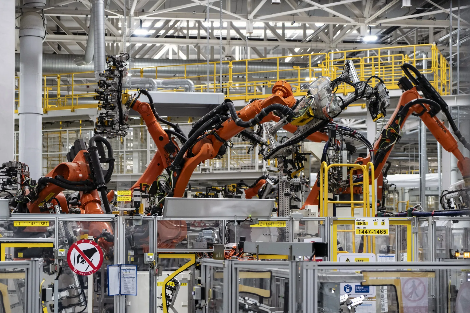 Robotic arms on the production line at the Volkswagen Anhui Automotive Co. factory in Hefei, Anhui Province, China, on Thursday, March 28, 2024. Volkswagen AG warned of a difficult year ahead as the German carmaker expects to fall further behind in its key market China, where a bruising price war is hurting returns.