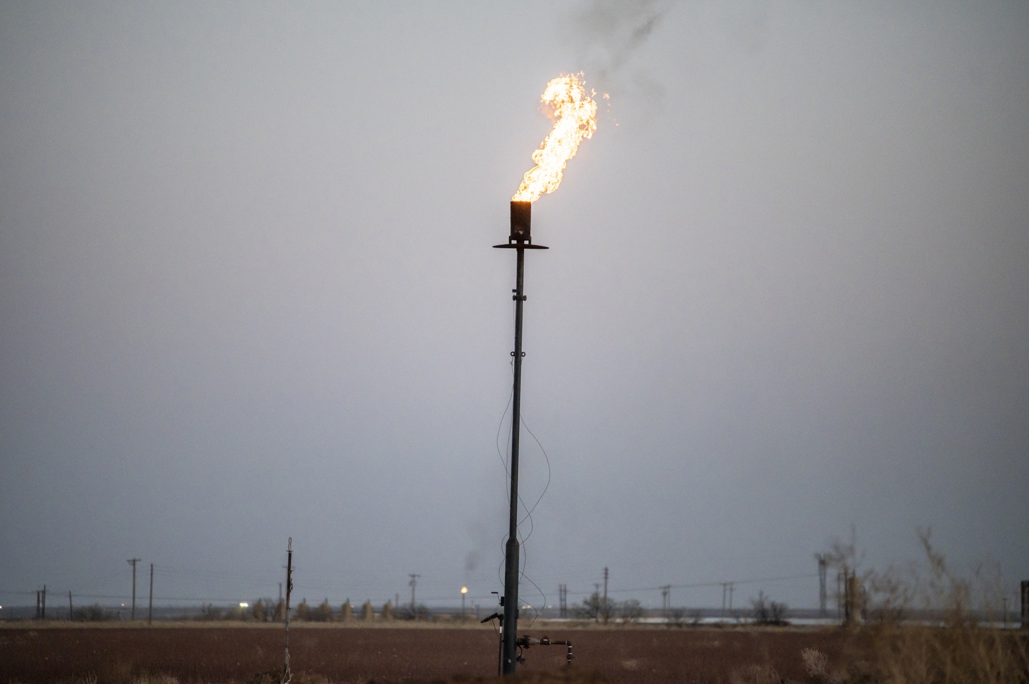 A gas flare stack at an oil well in Midland, Texas