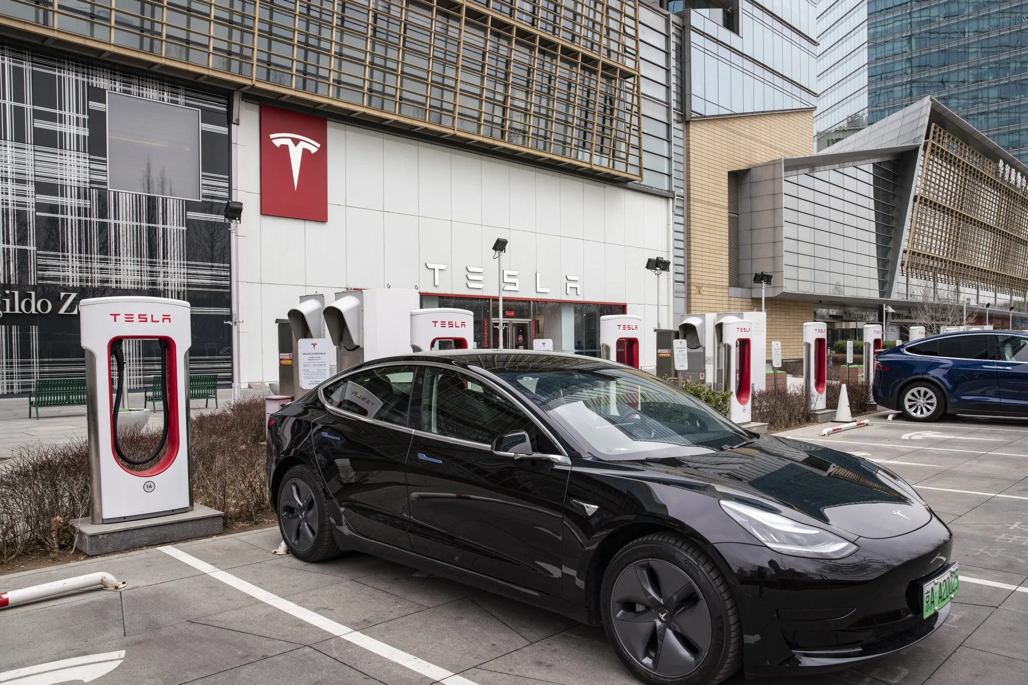 Tesla charging stations outside a company&nbsp;showrooms in Beijing.