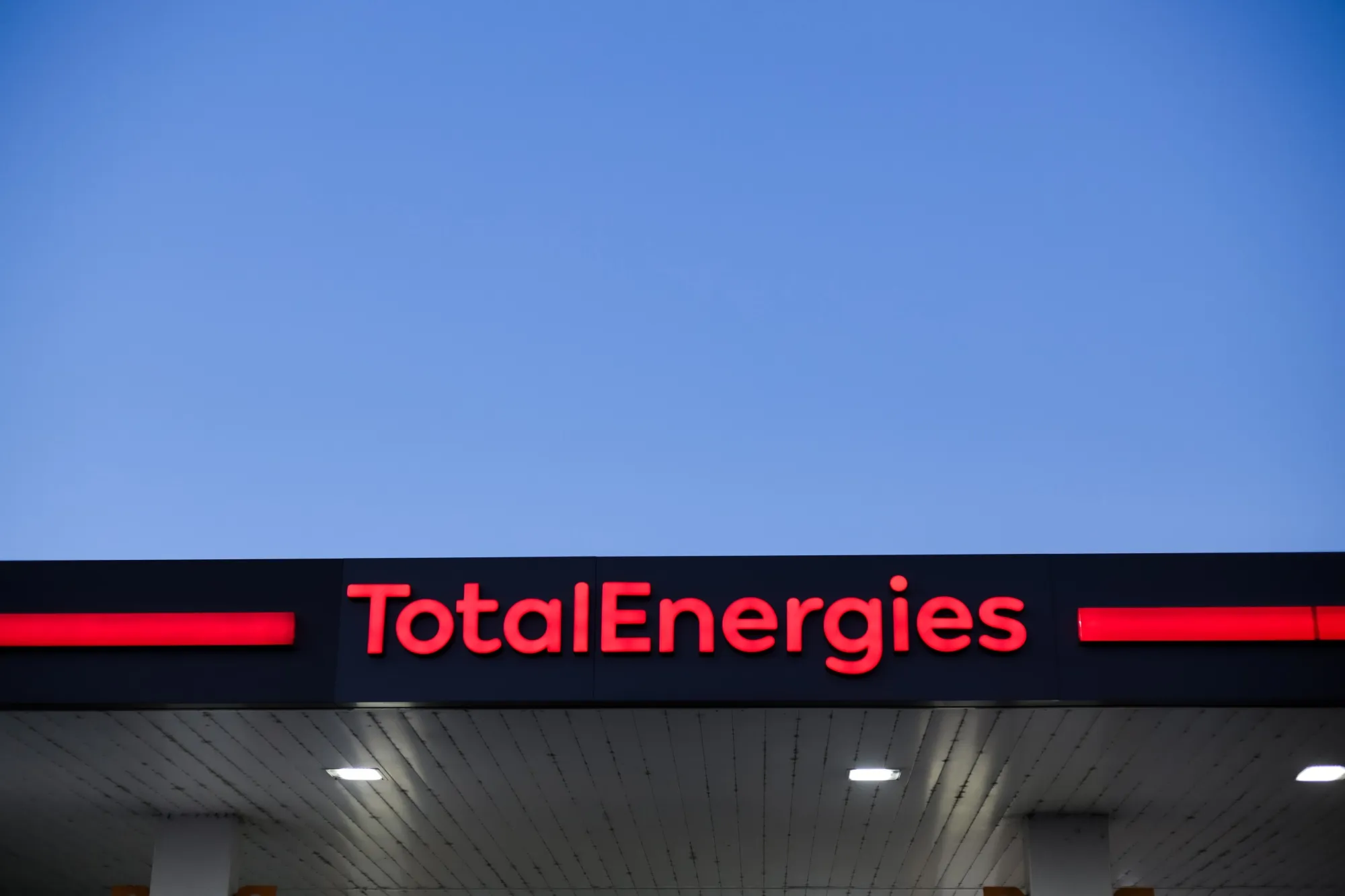 TotalEnergies SE Gas Stations as Energy Giant to Boost Investor Returns After Record Profit
