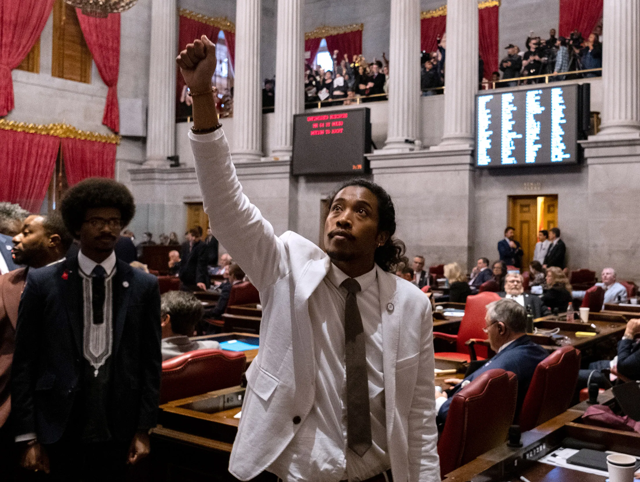 Justin Jones. center, and Justin P. Pearson, left. during a vote on their expulsion from the state legislature at the State Capitol Building in Nashville, Tennessee, on April 6.