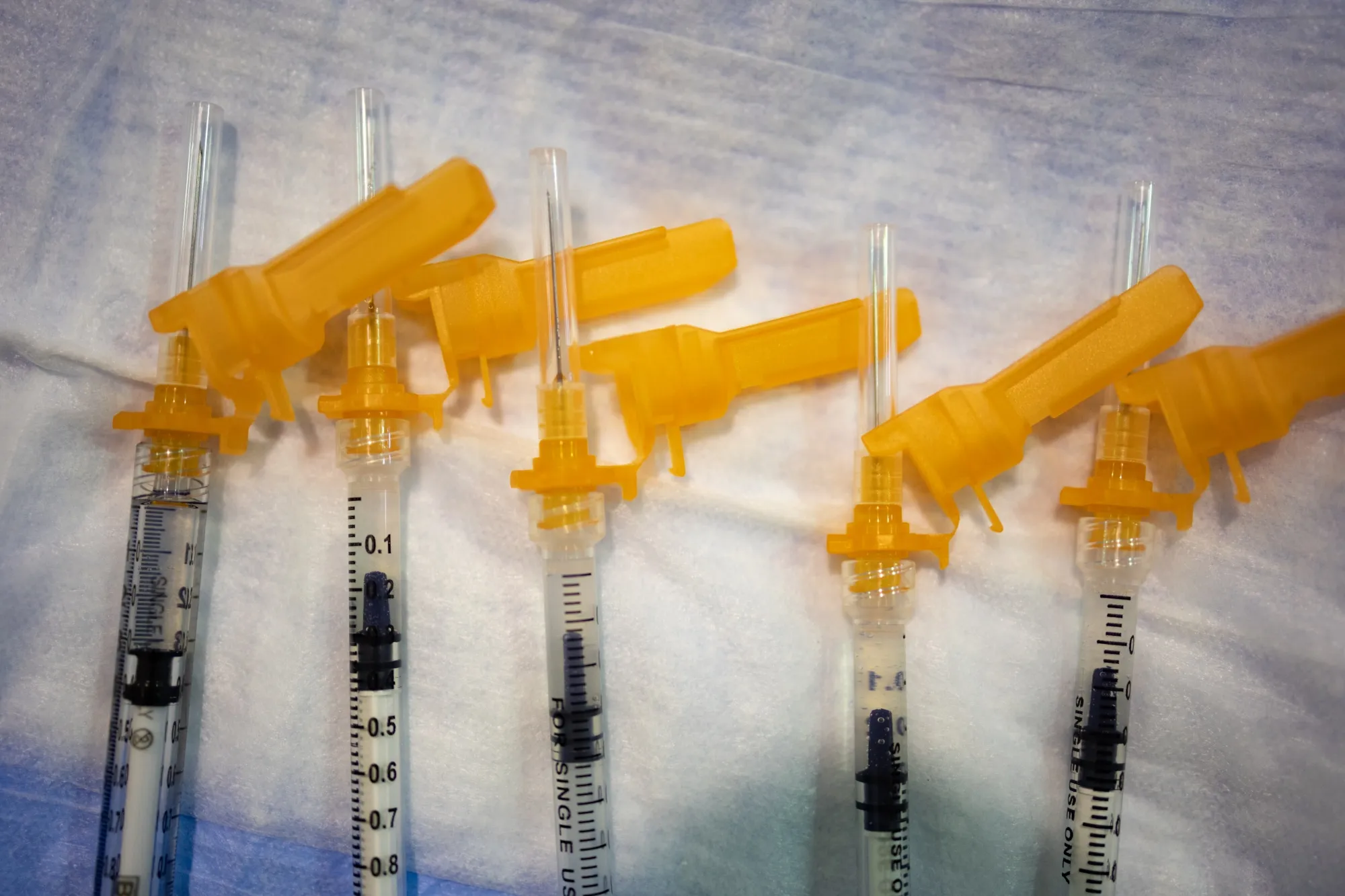 Syringes with doses of the Pfizer-BioNTech Covid-19 pediatric vaccine at a Salvation Army vaccination clinic in Philadelphia, Pennsylvania, U.S., on Friday, Nov. 12, 2021. The Pfizer-BioNTech Covid-19 vaccines for children ages 5 to 11-year-old are a third of the dose that adults receive.