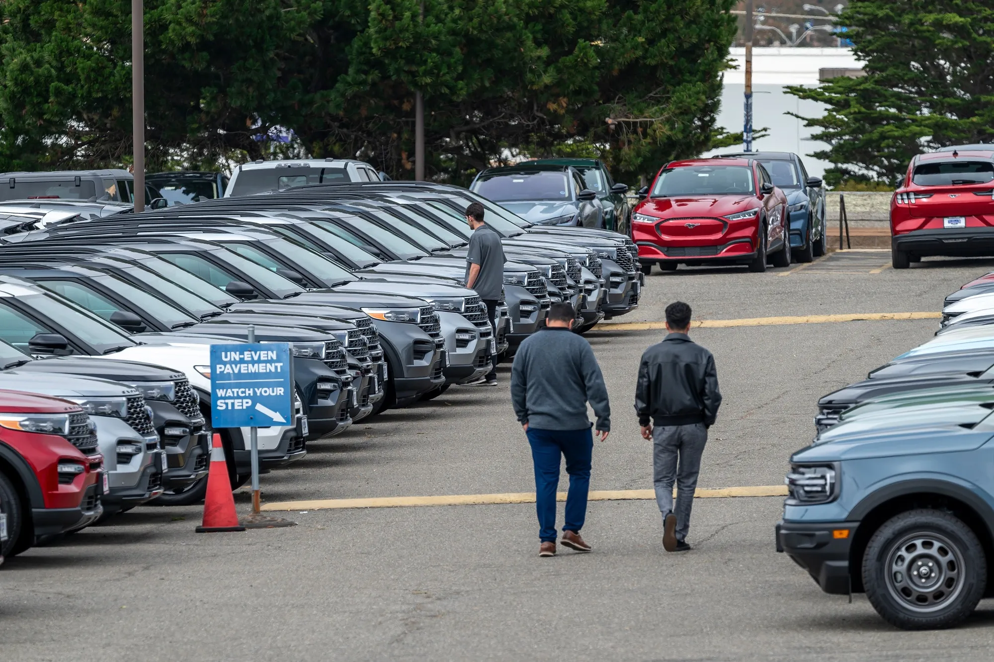 Customers view used Ford vehicles at a dealership in Colma, California, US, on Friday, June 21, 2024. CDK Global, a software provider to some 15,000 car dealers, has suffered cyberattacks that have knocked out service at many dealerships.