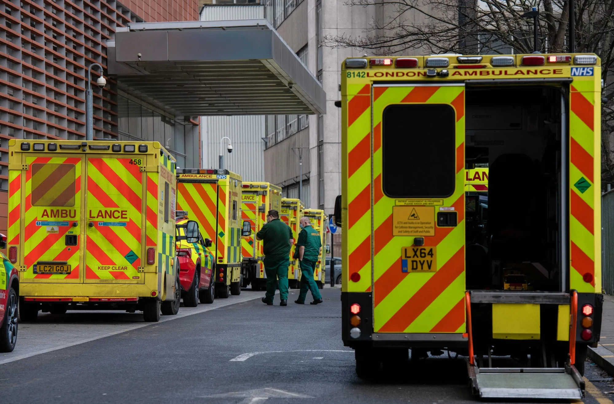 Ambulances queued up outside the Royal London Hospital in London, on Jan. 7.