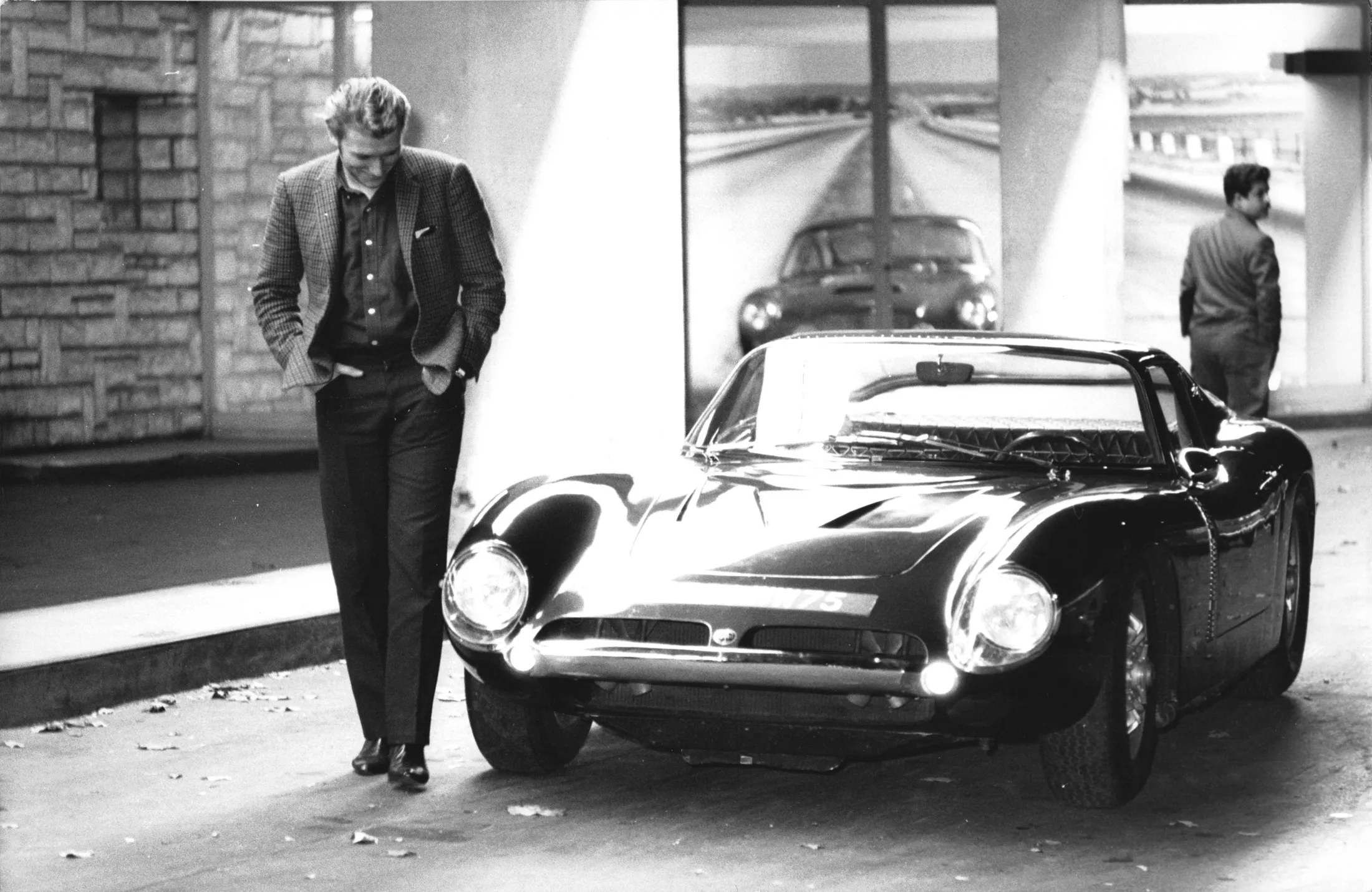 Singer Johnny Hallyday admires a Bizzarrini 5300 GT in Paris,&nbsp;circa&nbsp;1960.&nbsp;