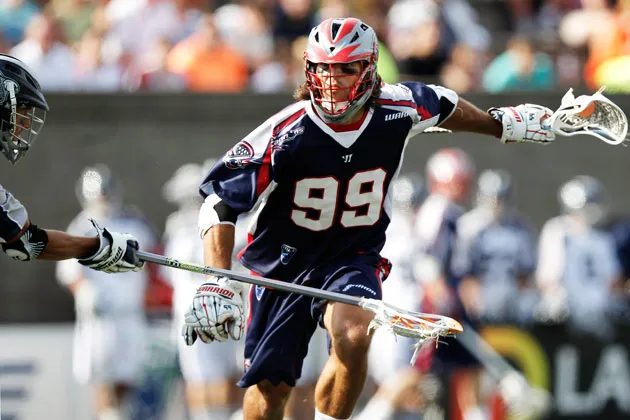 The Boston Cannons’ Paul Rabil (99) carries the ball against the Chesapeake Bayhawks in a Major League Lacrosse game