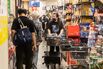Shoppers at Takeya Store Ahead of CPI Figures
