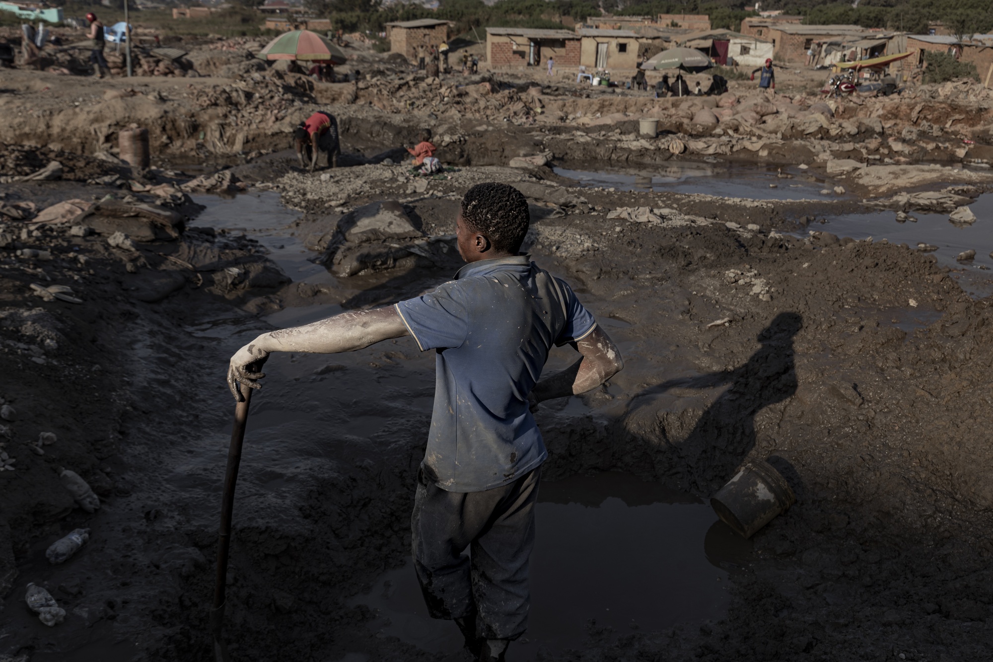 A worker at an artisanal cobalt and copper mine site in Kolwezi, Democratic Republic of Congo.
