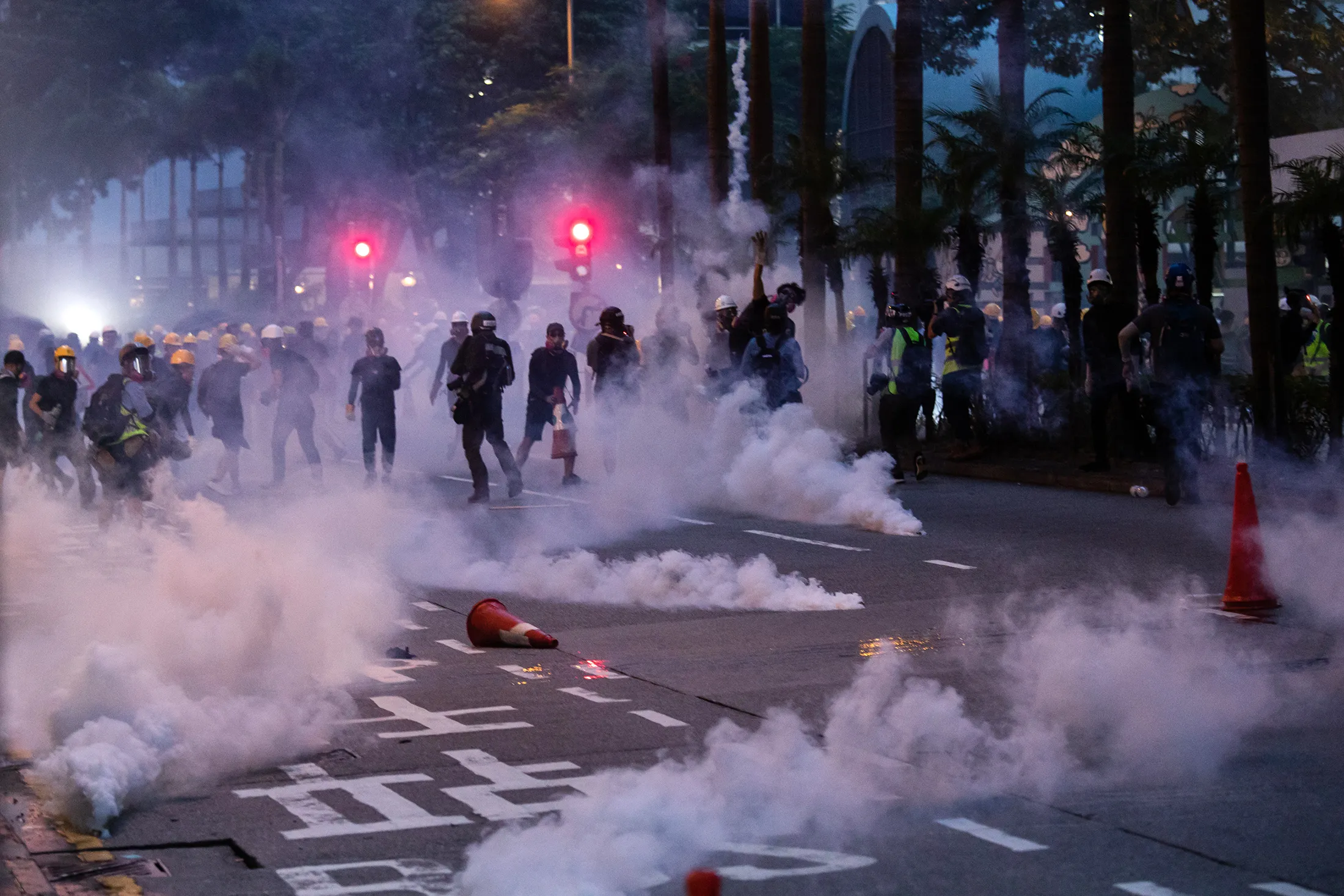 Riot police deploy tear gas during a protest on Aug. 11.